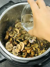 pouring white wine in instant pot