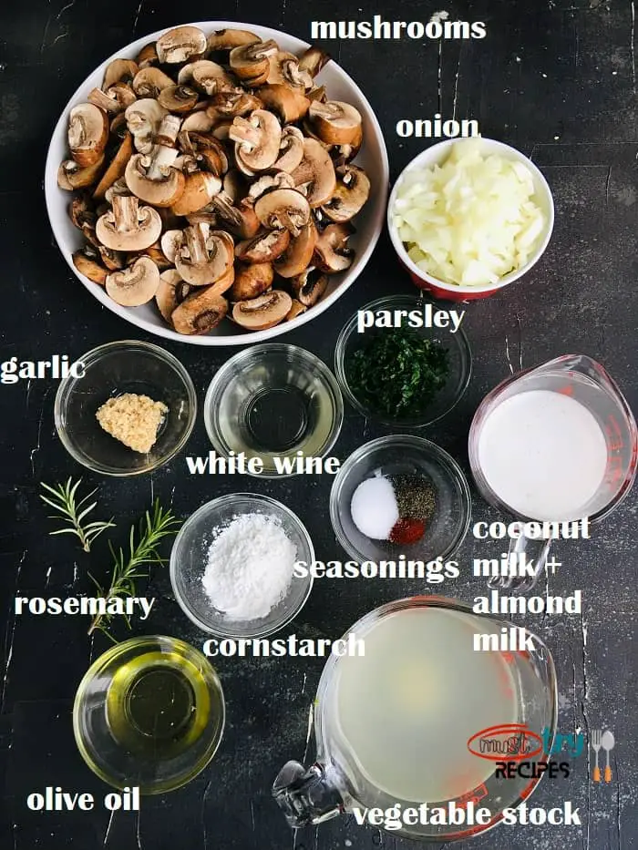 vegan mushroom soup recipe ingredients on a black surface