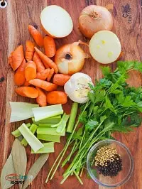 coarsely chopped fresh veggies on a wooden board