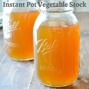 instant pot vegetable stock in two mason jars