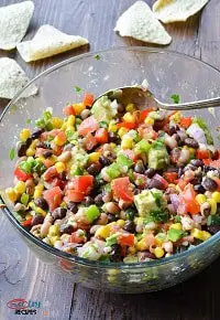 healthy cowboy caviar in a clear bowl with a spoon