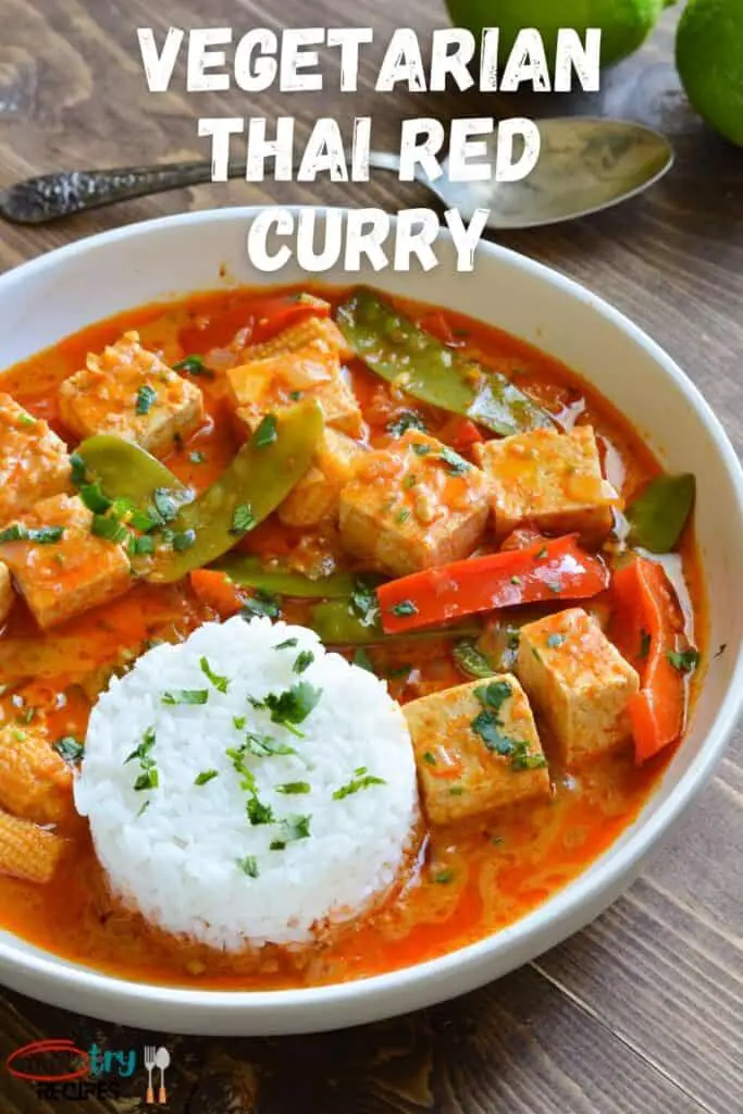 best vegan red Thai curry served with white rice & garnished with cilantro on a white plate