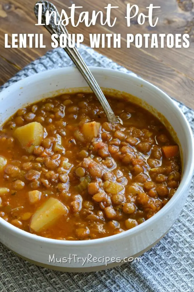 instant pot green lentil soup in a white bowl with a spoon