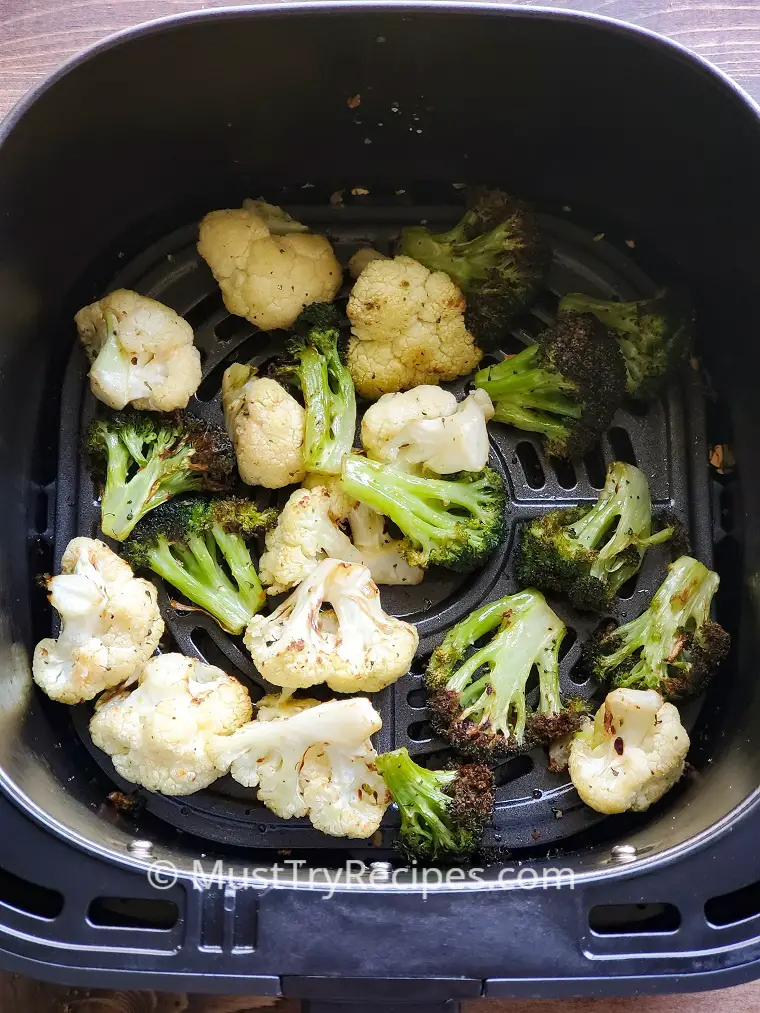 broccoli and cauliflower in air fryer basket