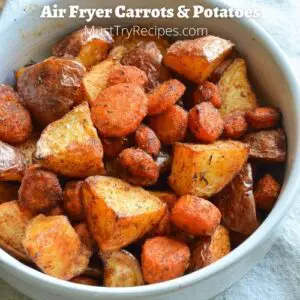 air fryer carrots and potatoes in a white bowl