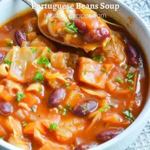 instant pot portuguese bean soup in a white bowl with a spoon