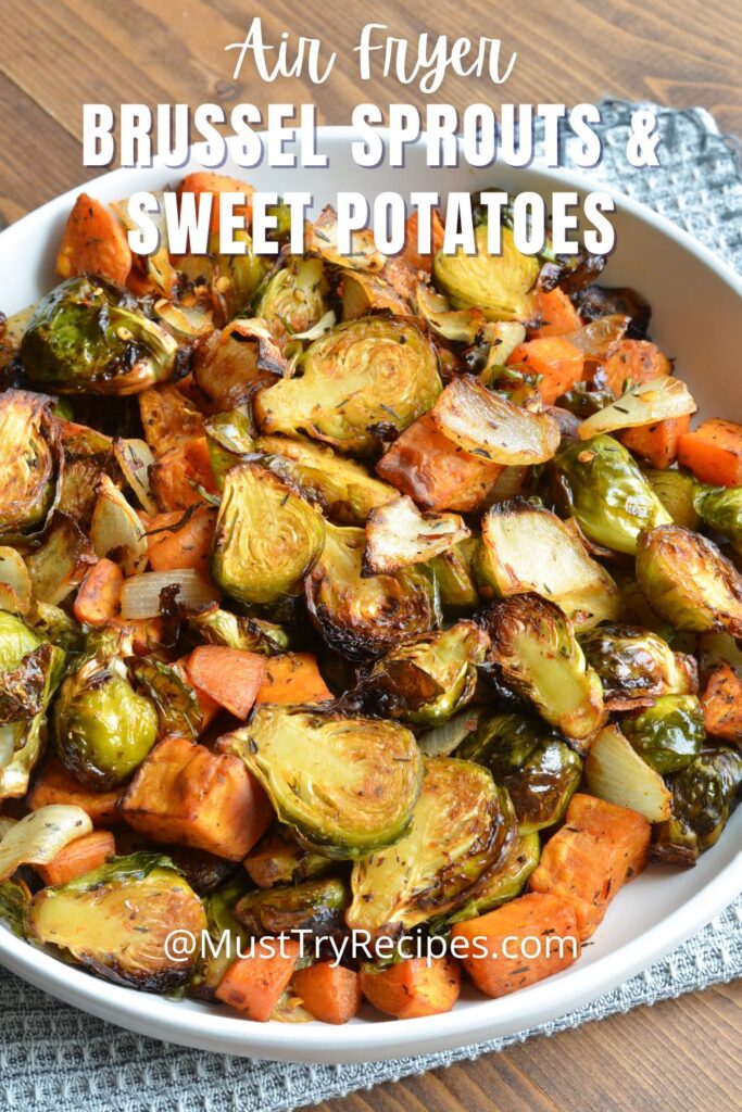 brussel sprouts and sweet potatoes on a white plate 