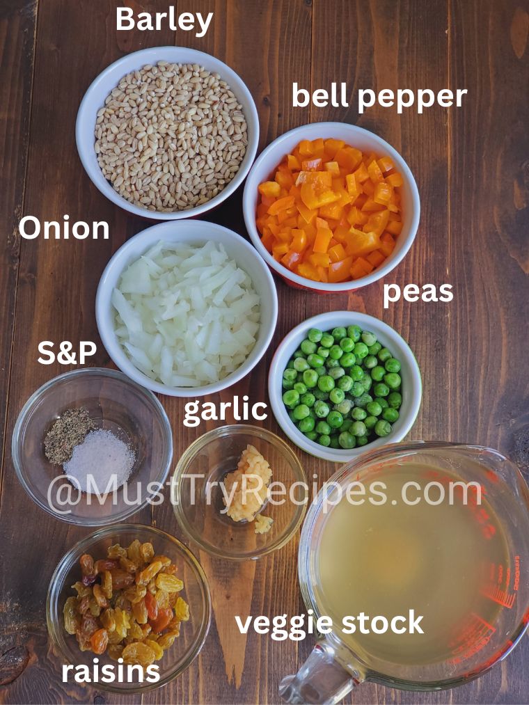 recipe ingredients in various-sized  bowls kept on a wooden board