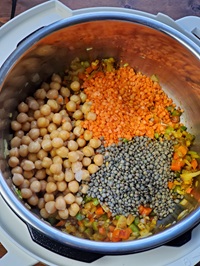 adding chickpeas and lentils